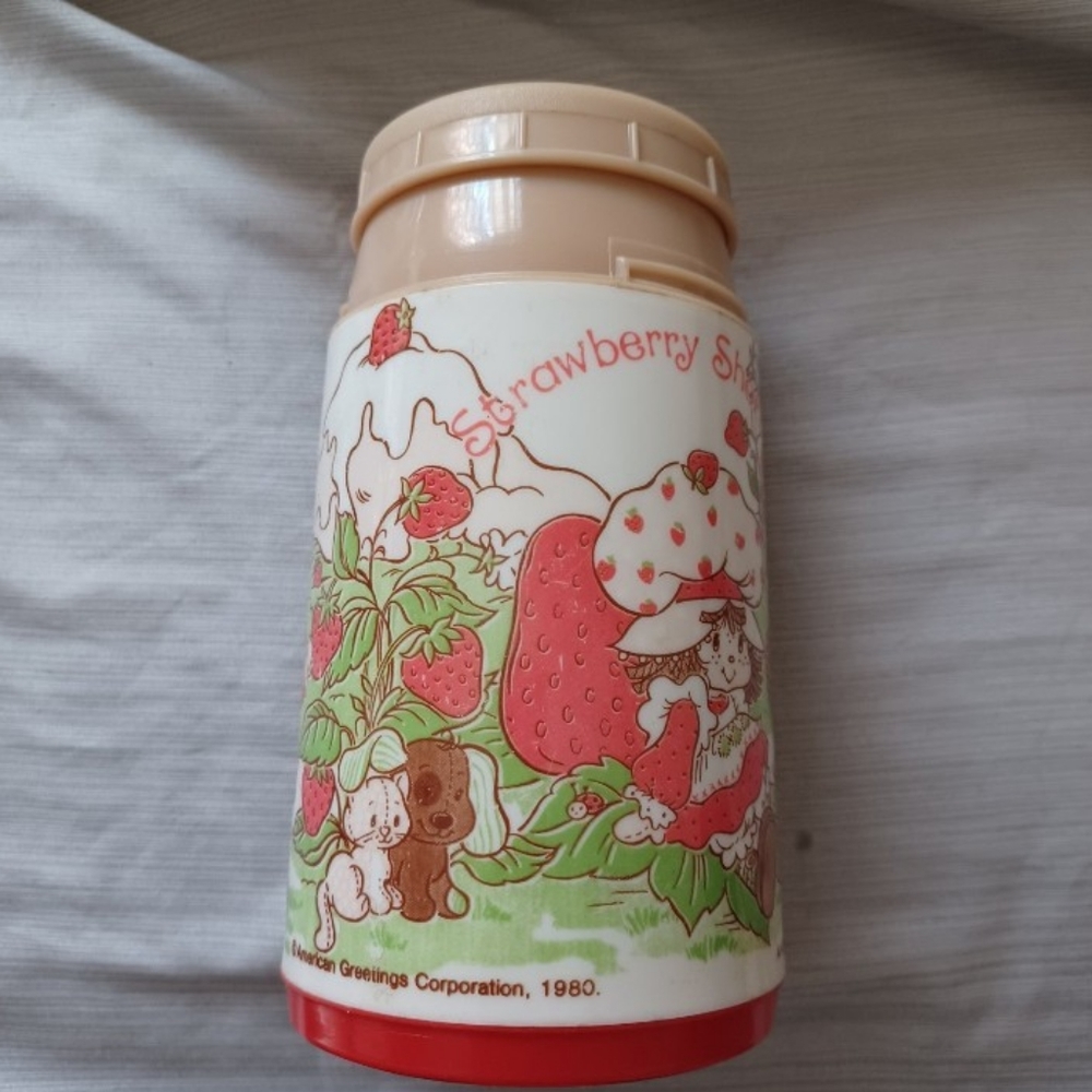 Vintage strawberry shortcake drinking thermus